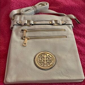 Elegant Cream Crossbody Bag with Gold Accents